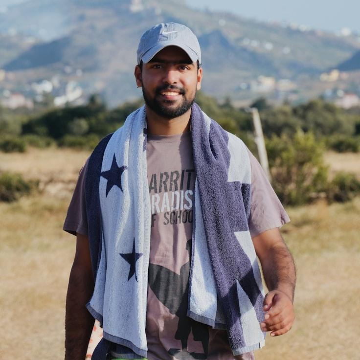 Avery Chen, Lead Design Curator at CleanFrameCluster, reviewing corporate floral arrangements